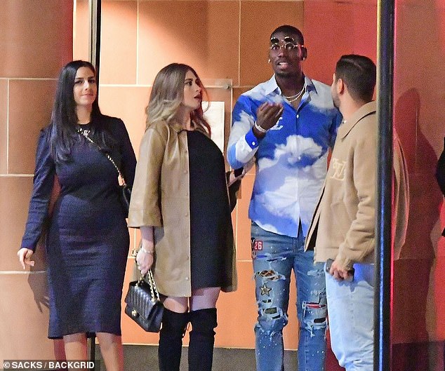 Pogba with his wife and friends . The french midfielder spent his time off in England