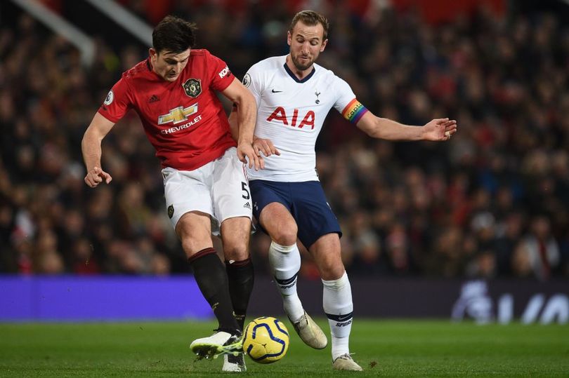 Harry Maguire Battles For The Ball Against Harry Kane